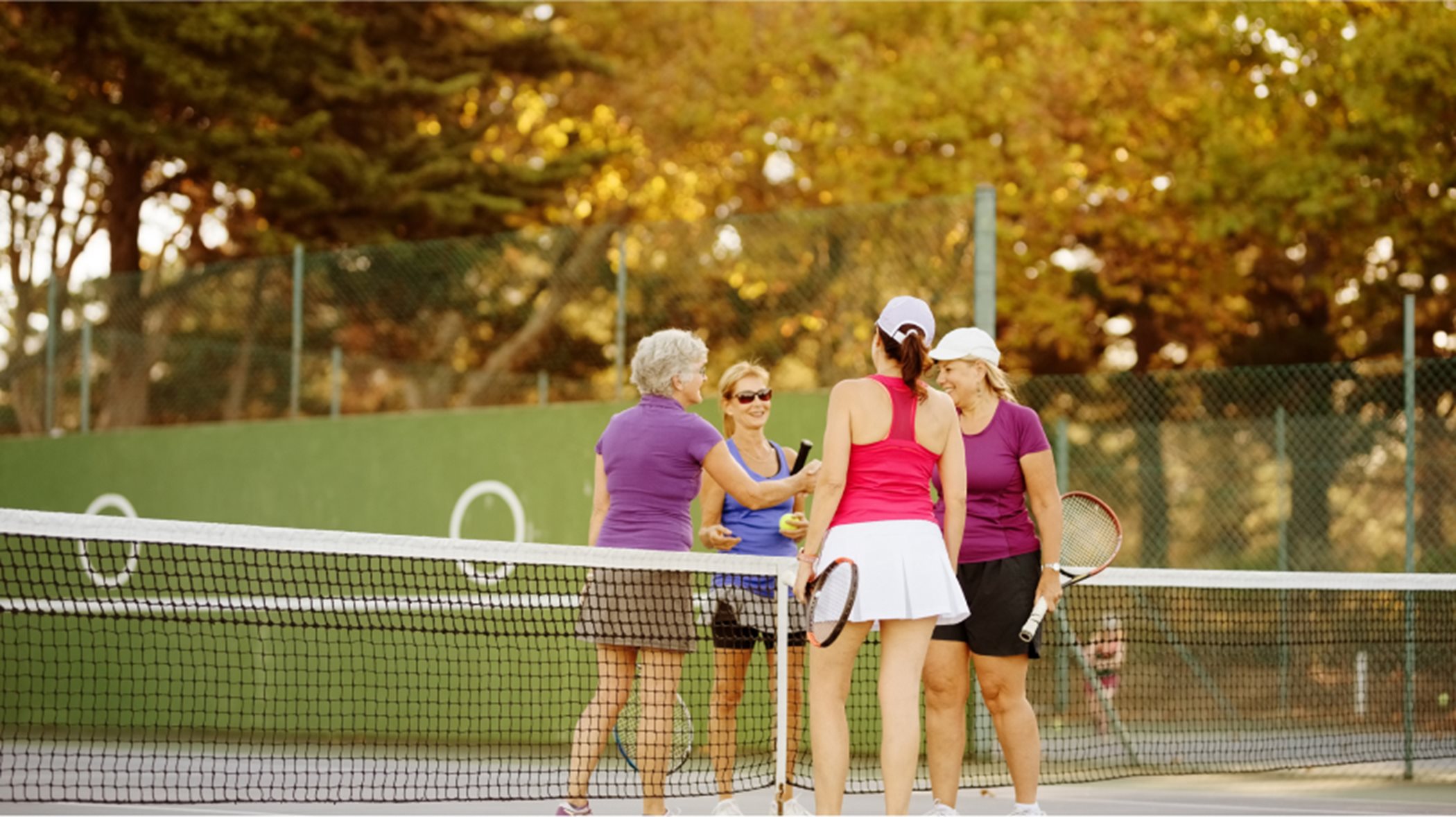 A group playing tennis