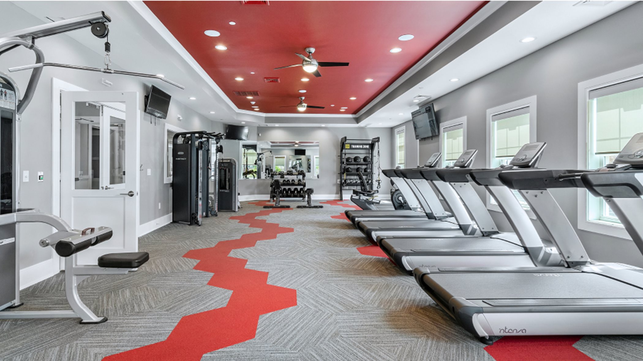 Fitness center with treadmills and weight lifting equipment