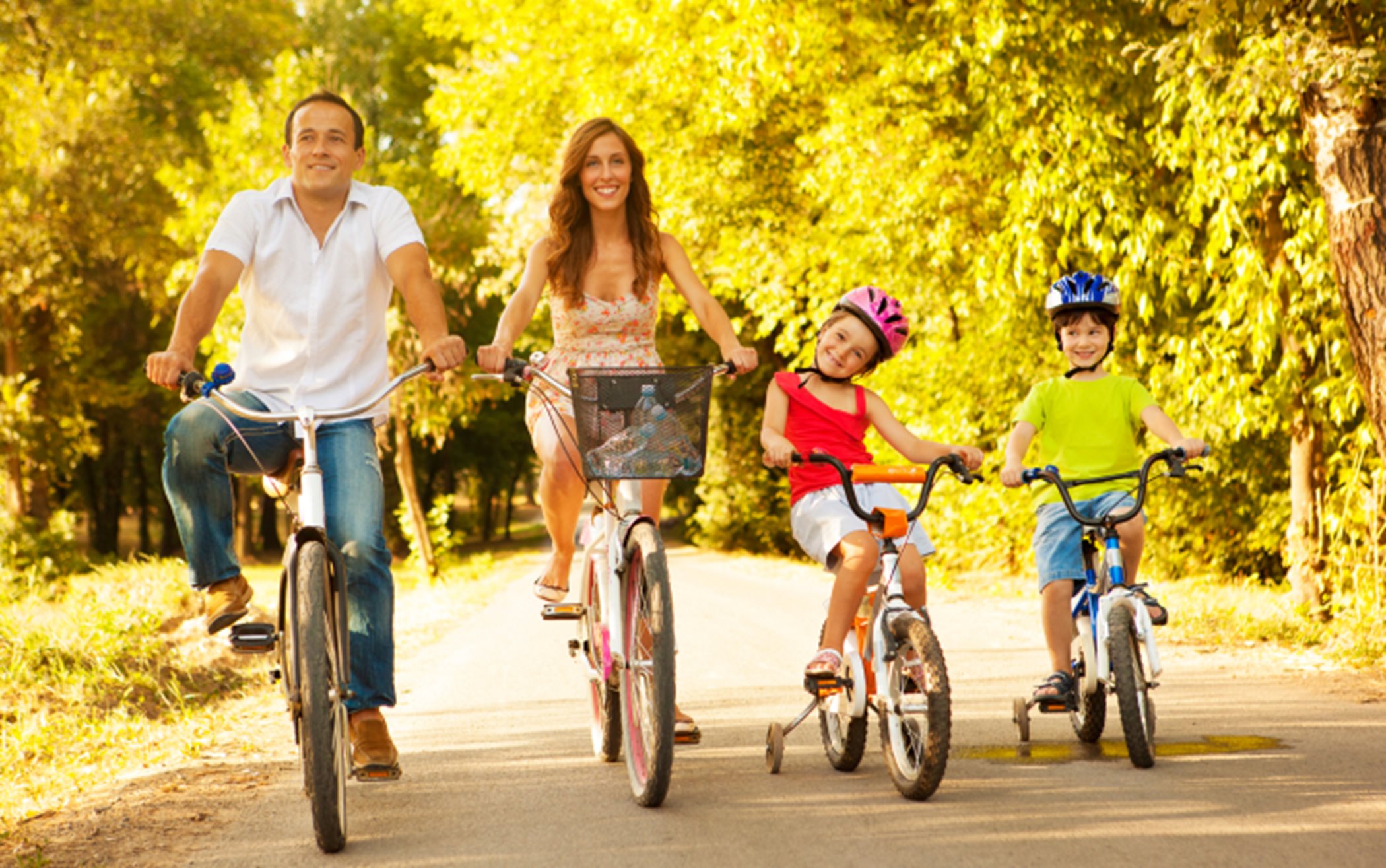 A family riding bikes