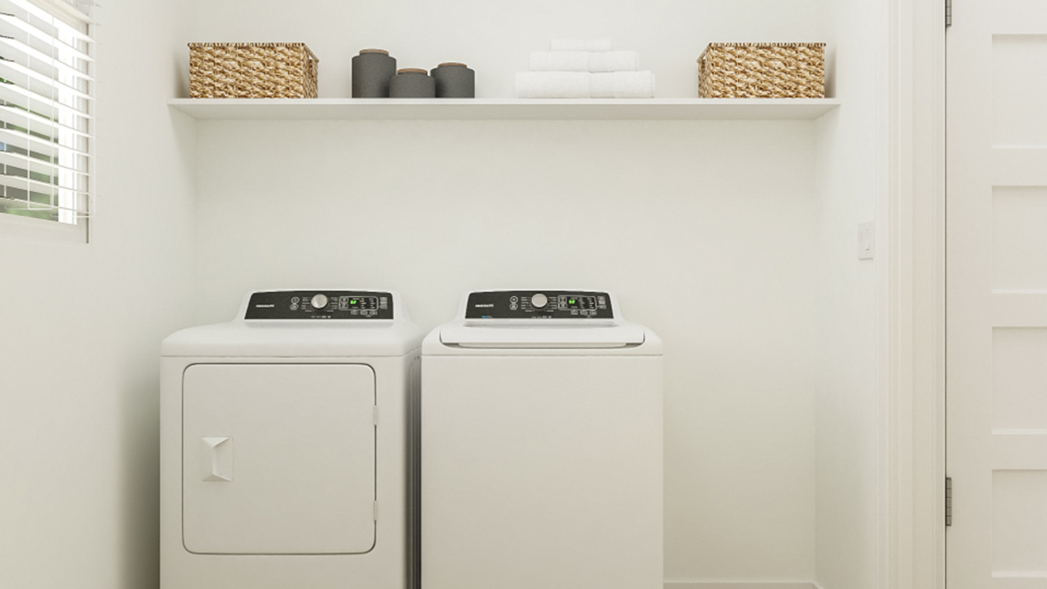 Laundry room with a washer and dryer