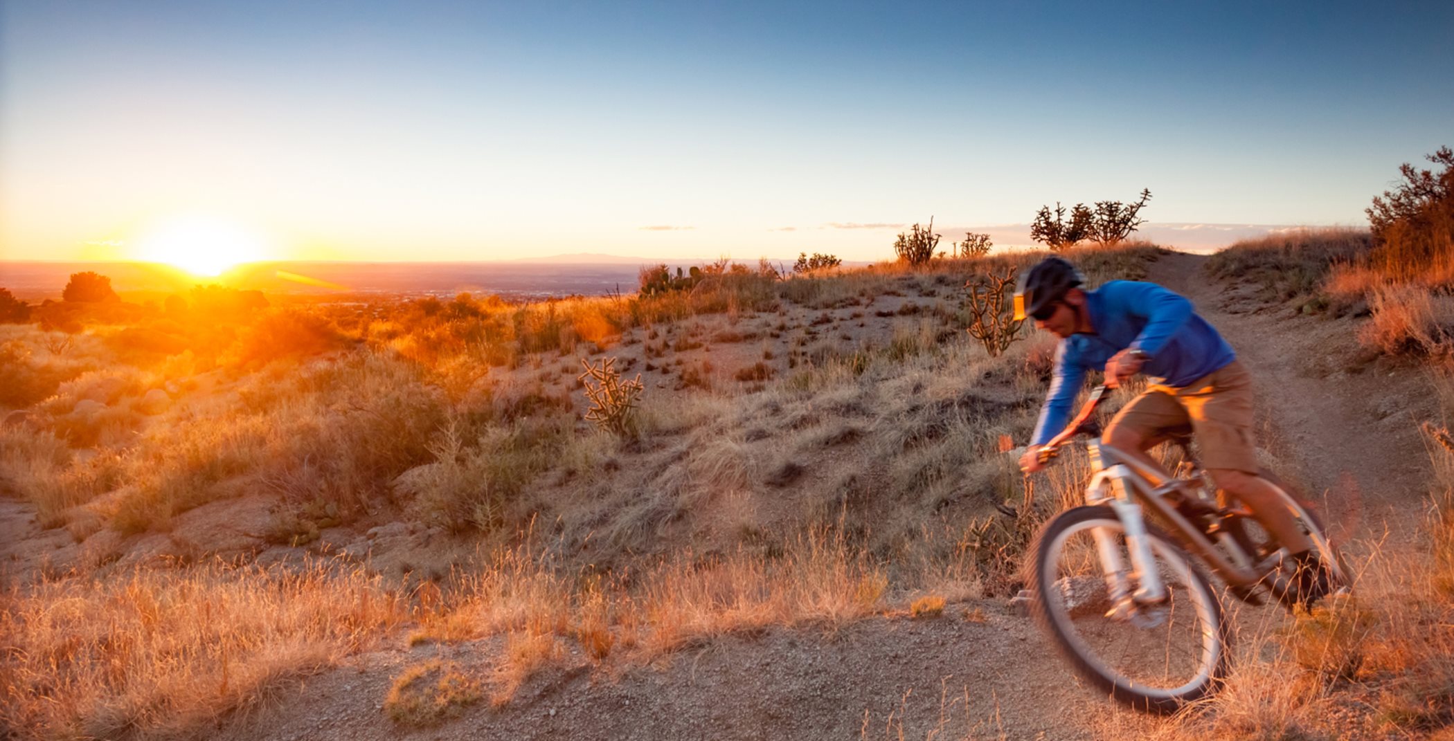 Desert mountain biking at sunset