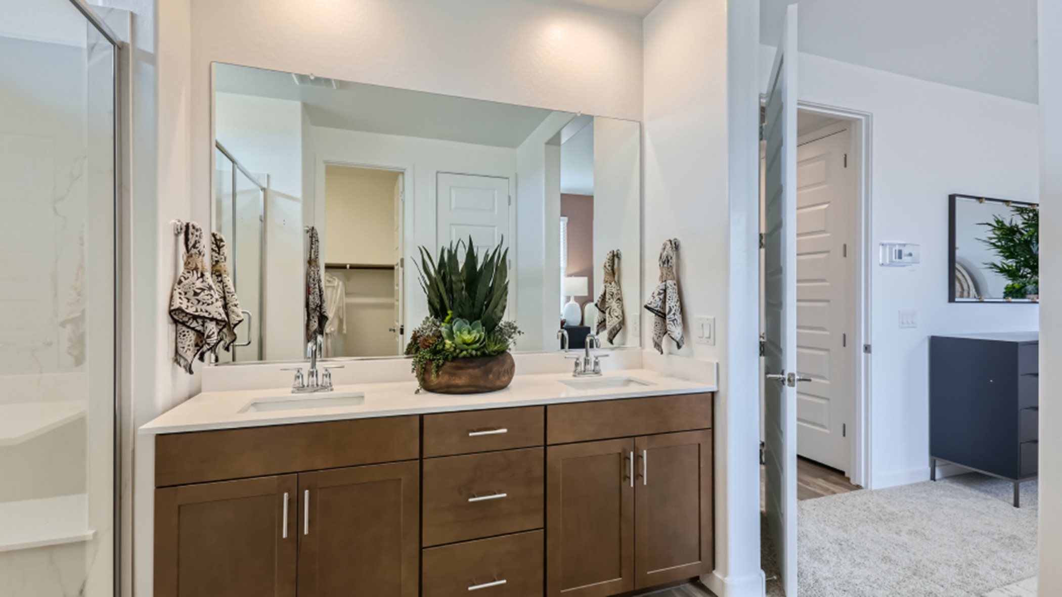 Owners bathroom with dual sinks