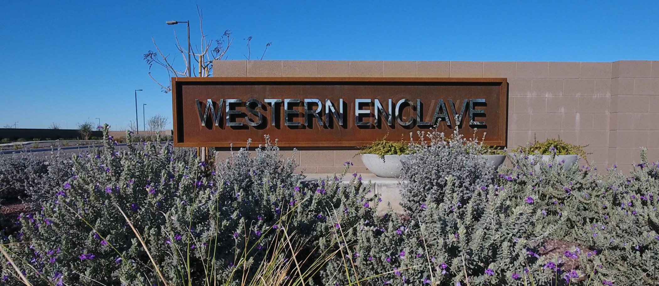 western enclave entry sign