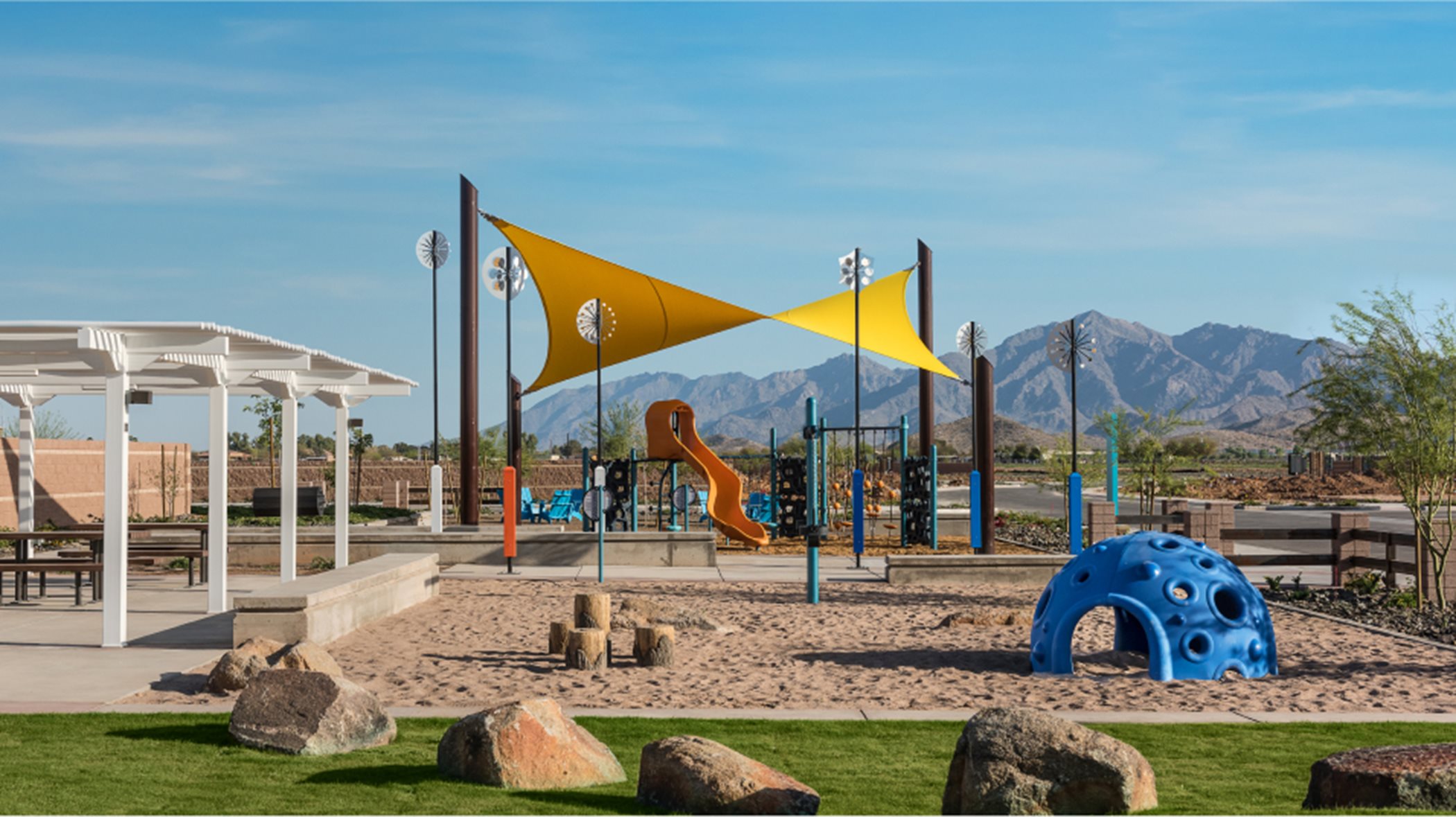 Playground with a slide and some shaded areas