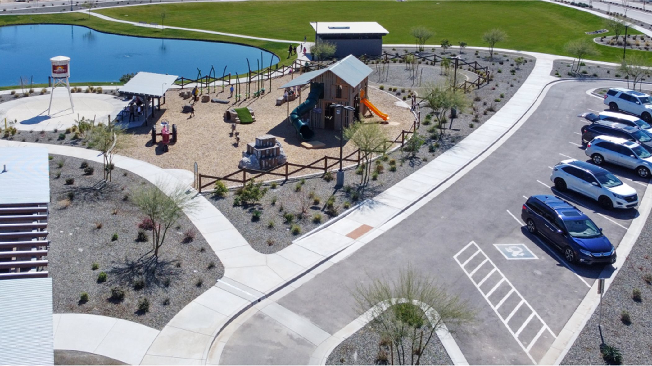 Aerial shot of the playground and community center parking lot