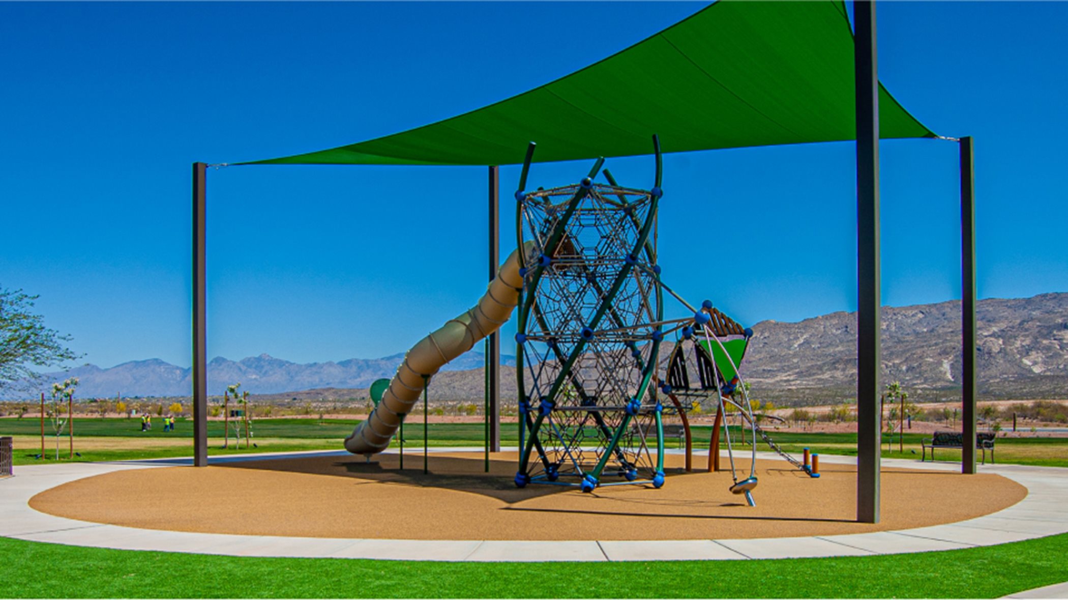 View of jungle gym with shade over it 