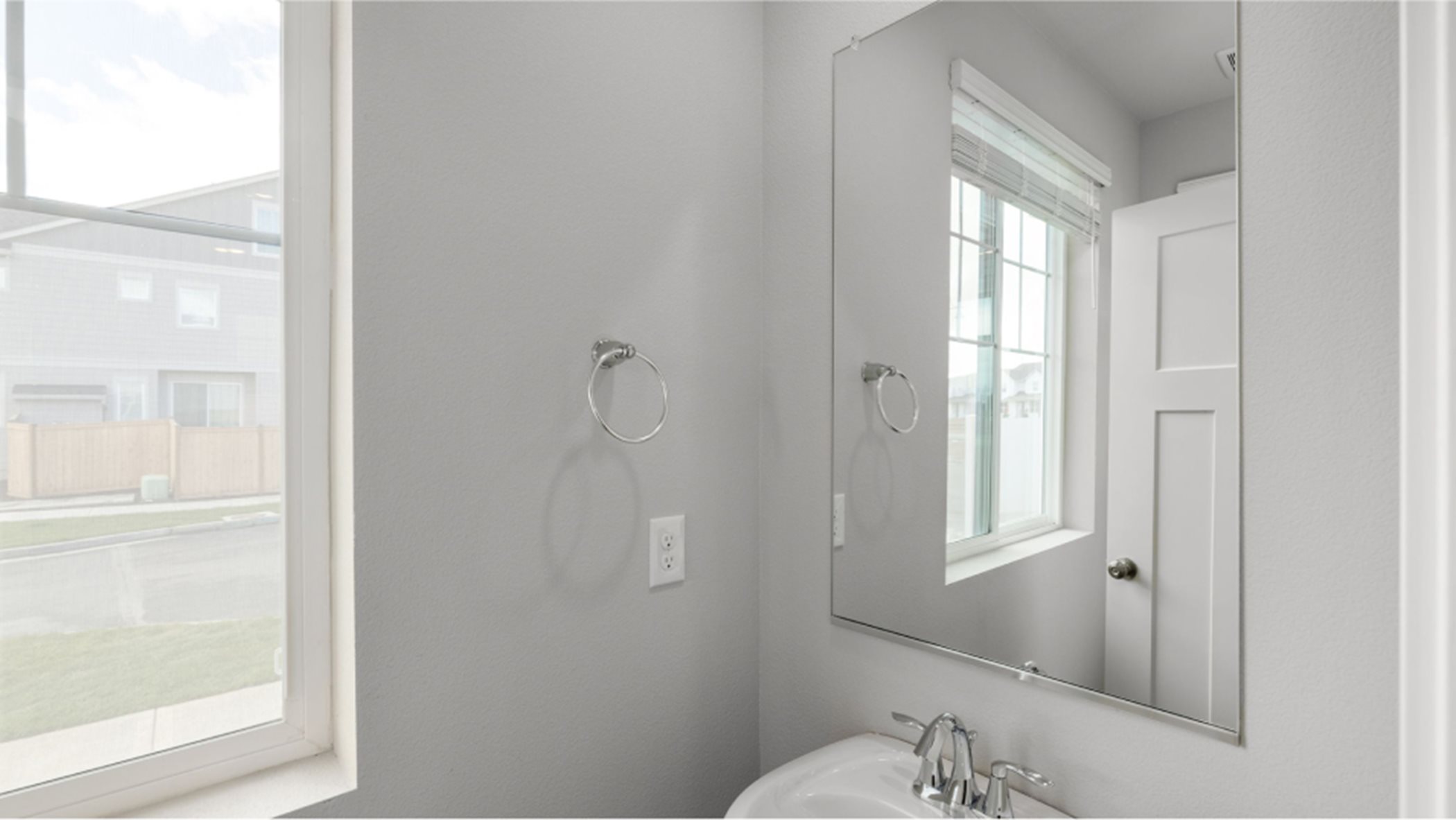Powder room with large window