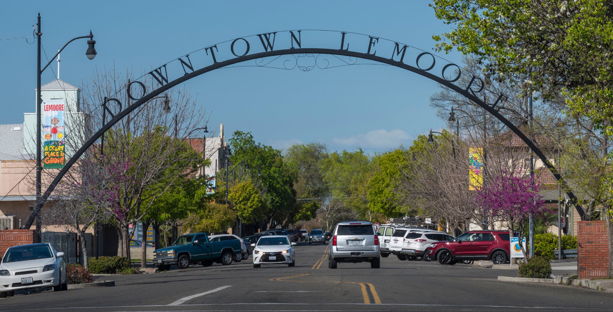 Downtown Lemoore monument sign over streetscape