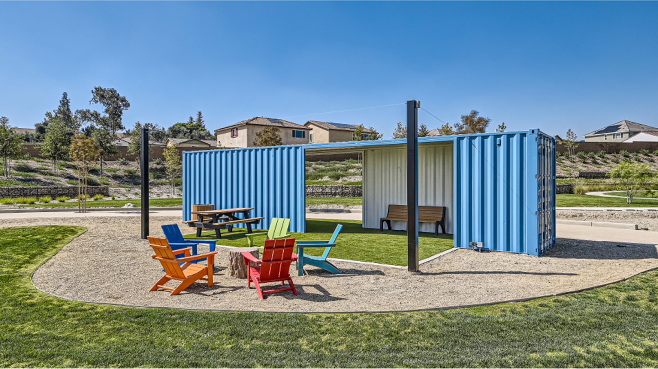 Shaded structures and seating at the River Ranch park