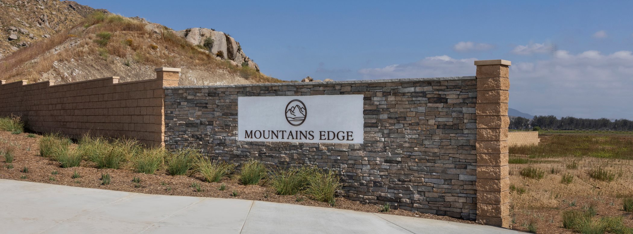 Mountains edge hero monument sign