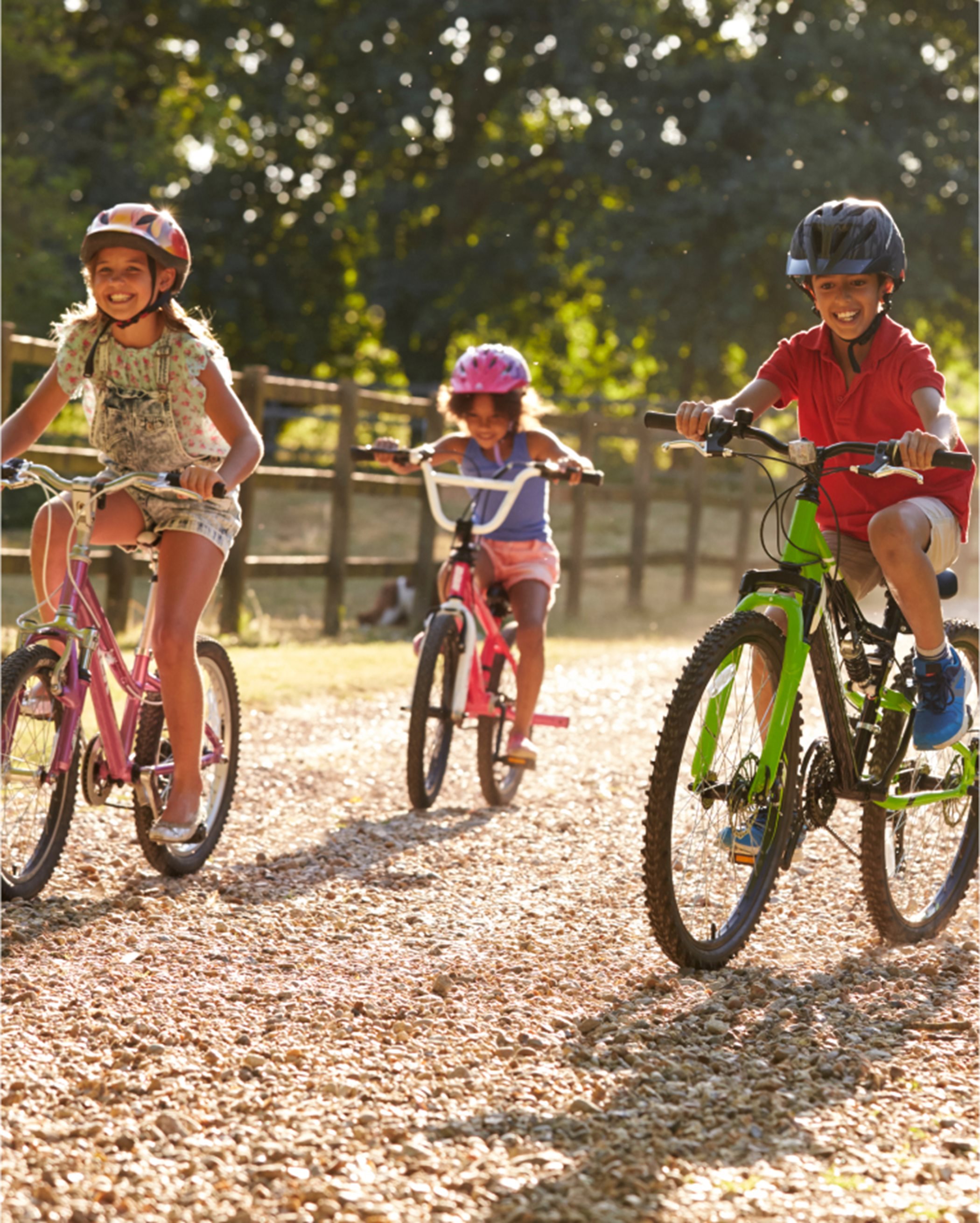 A group of kids riding bikes