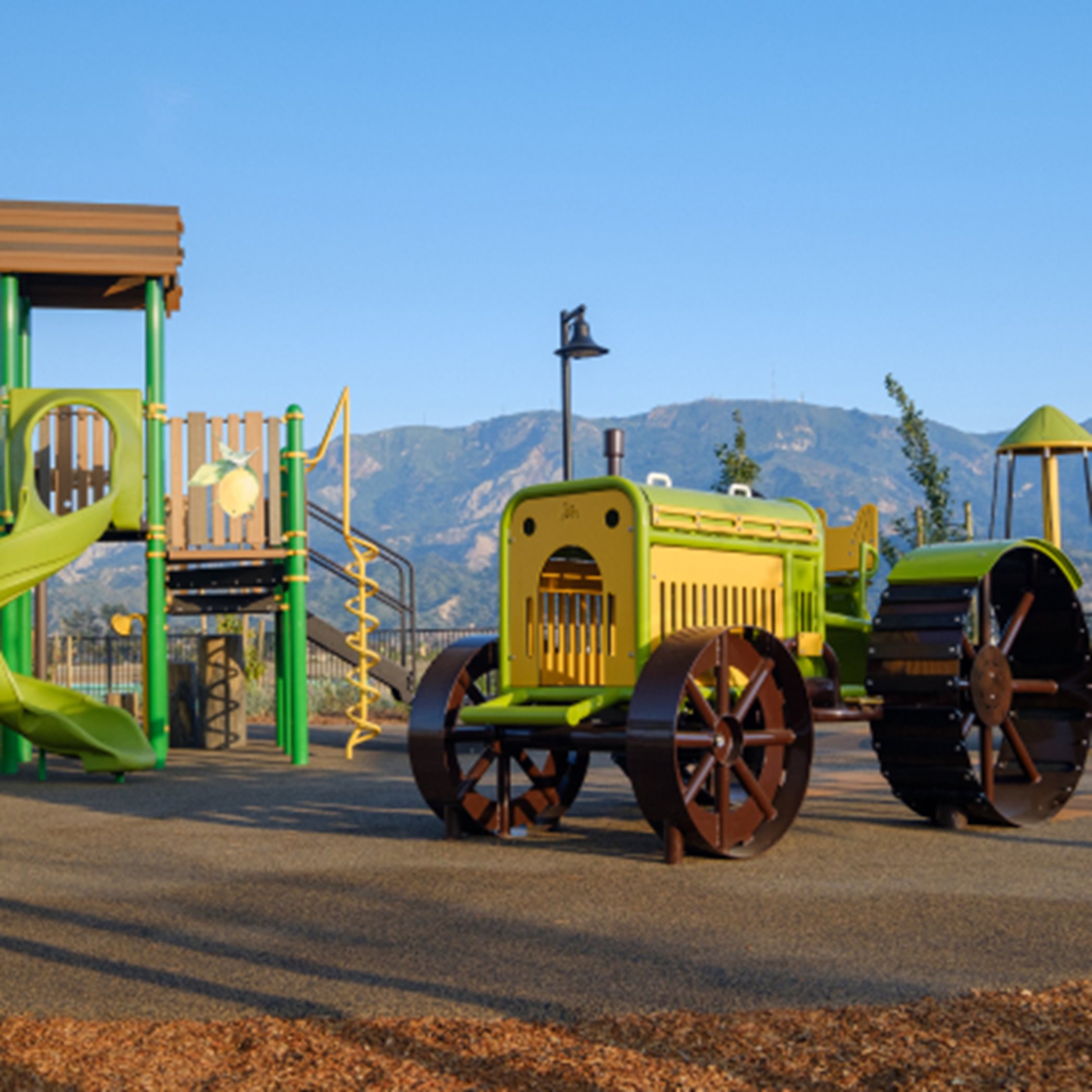 arvest at Limoneira slide, twisty firepole and a play tractor
