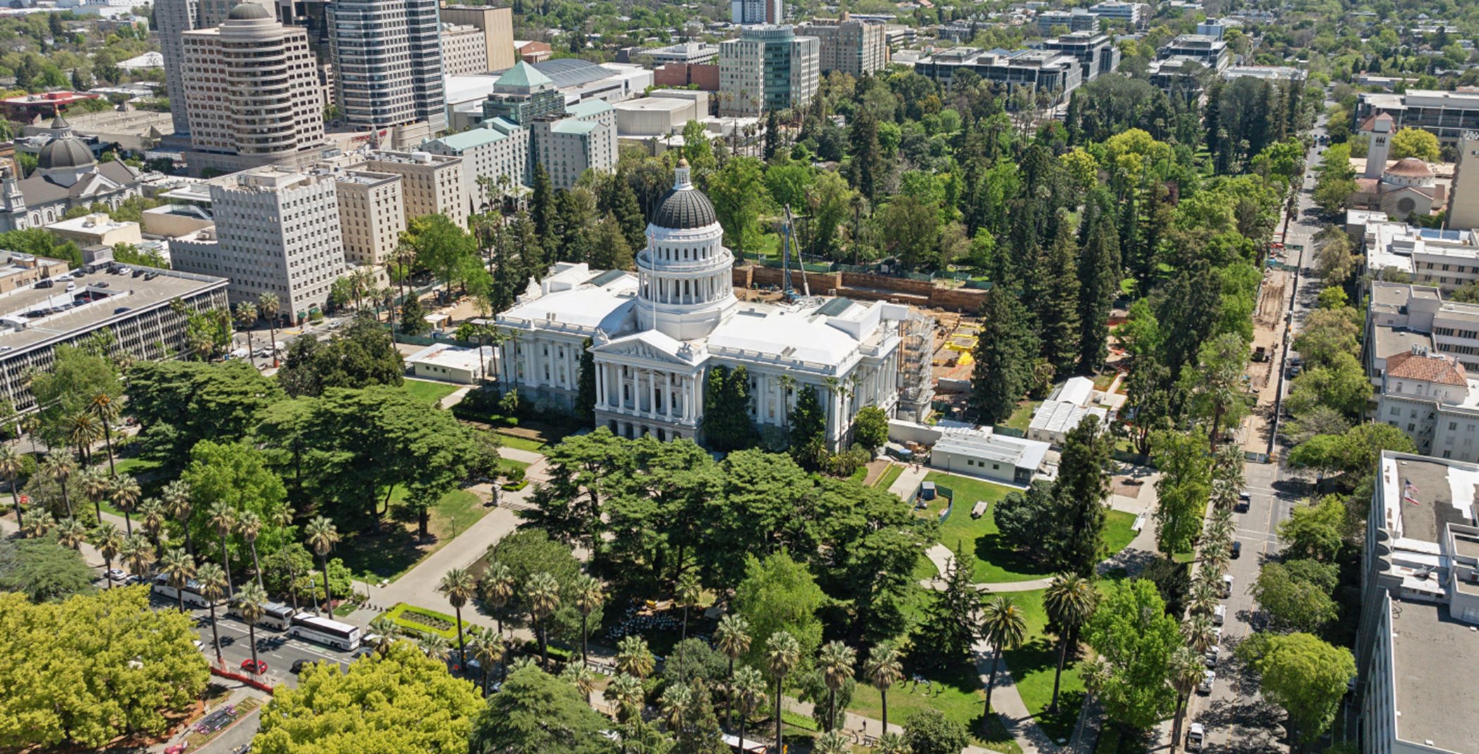 Aerial view of the California State Capitol building and park