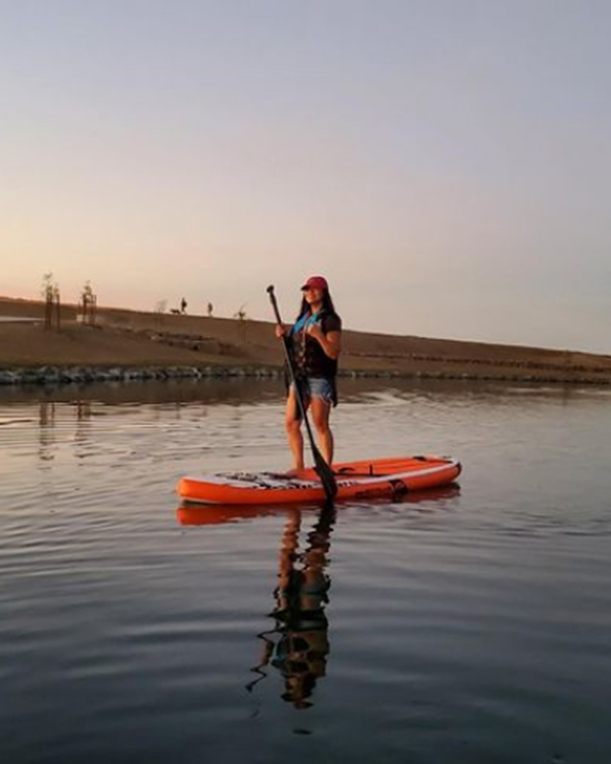 A person paddleboarding