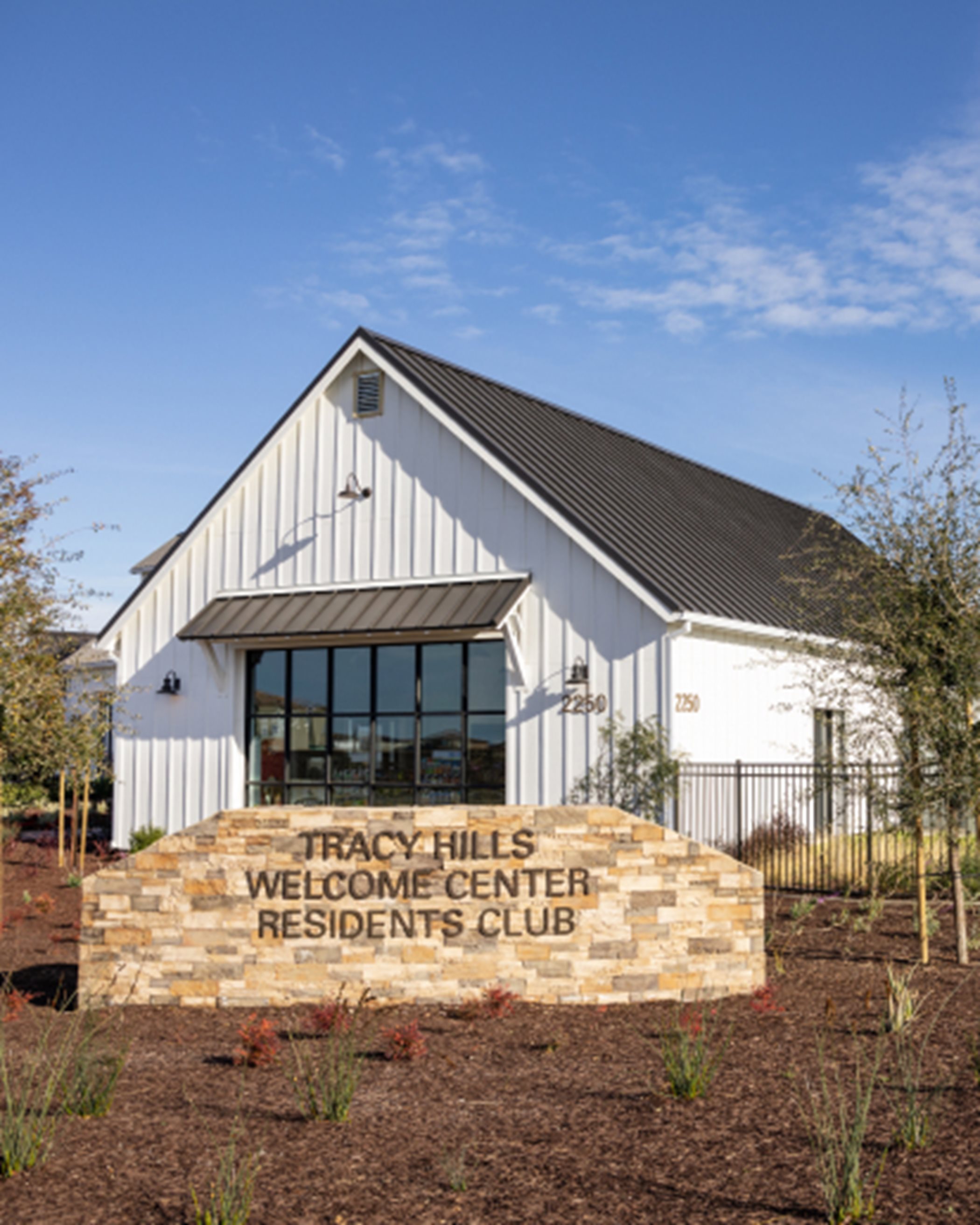 Exterior of welcome center with sign 