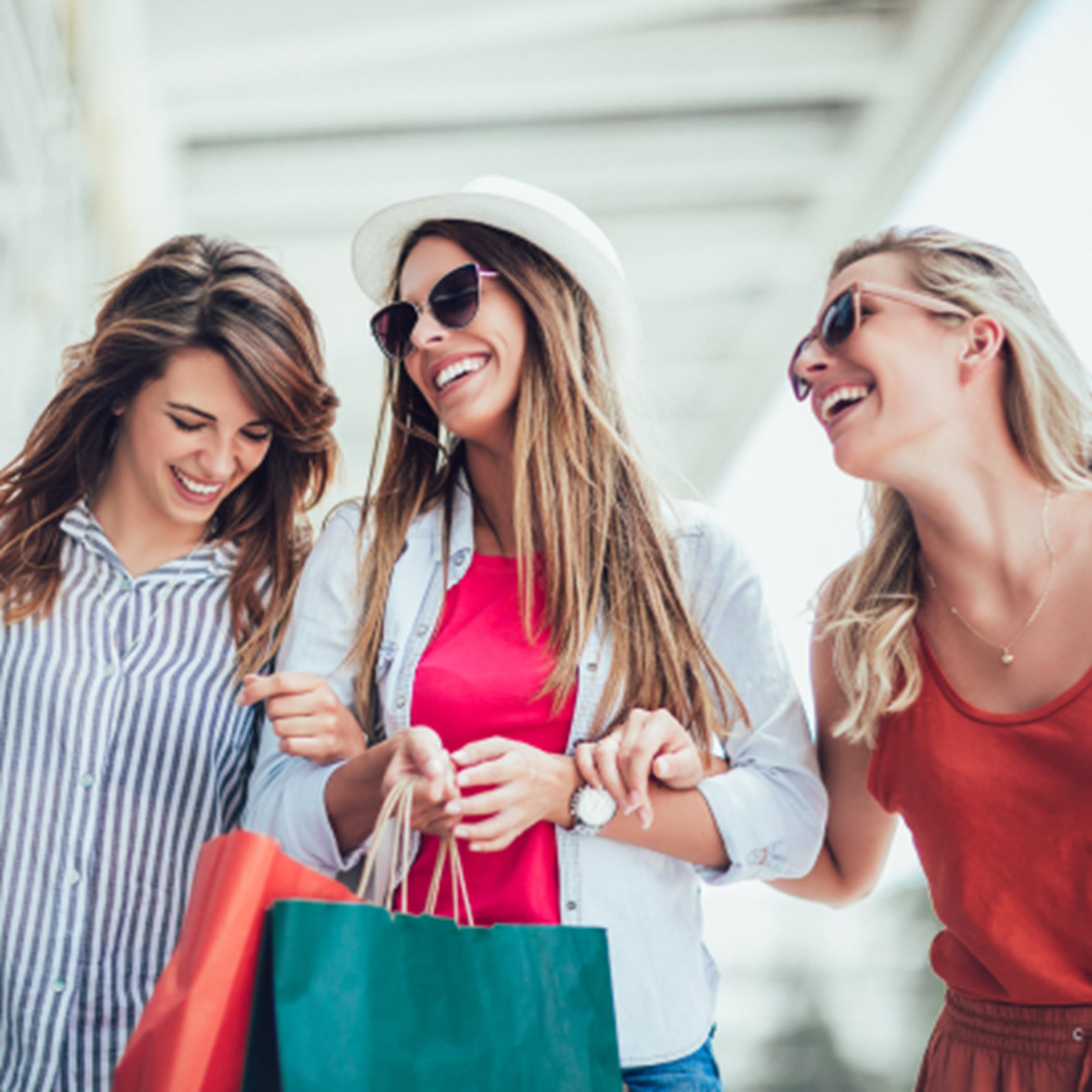 Women smiling and shopping