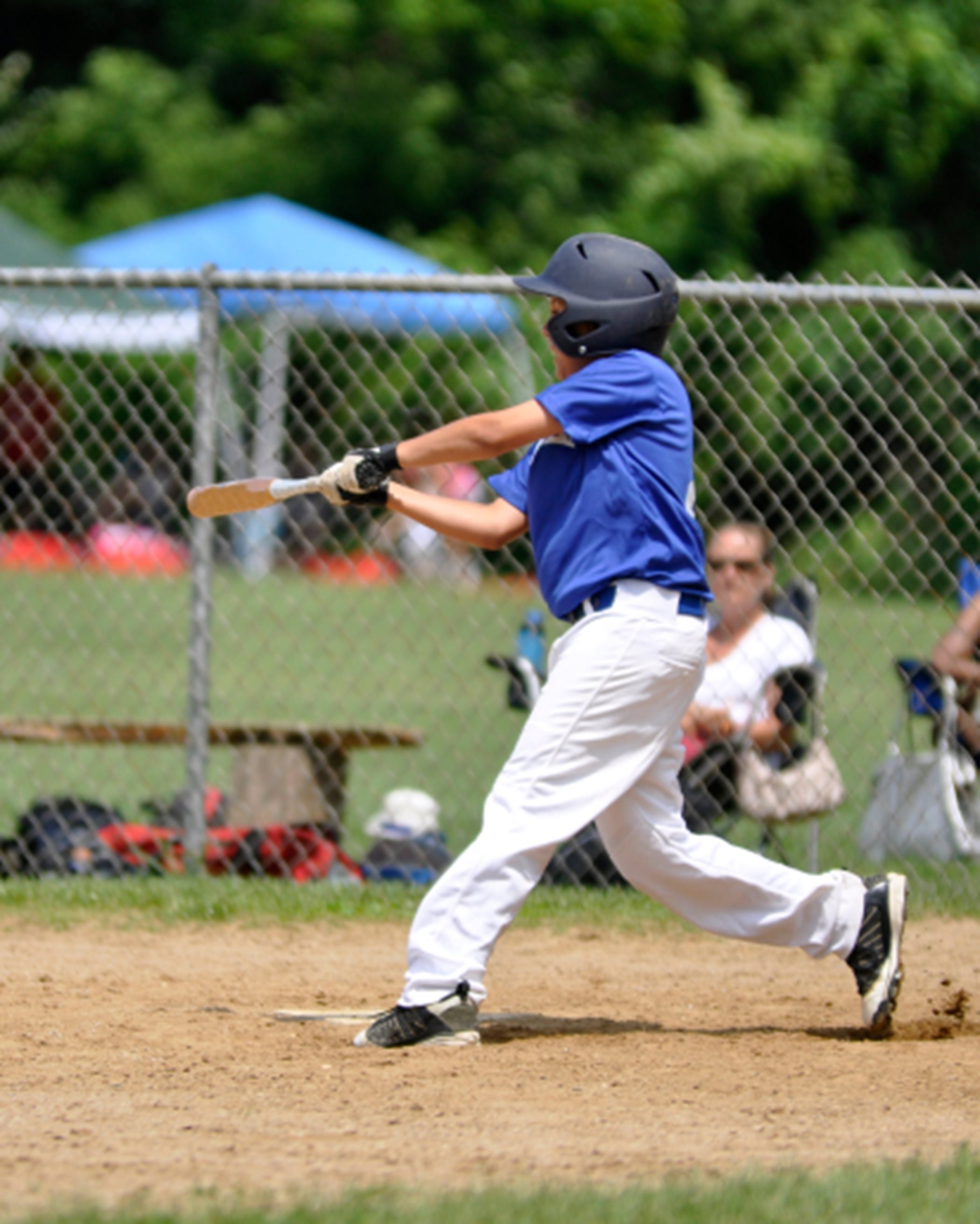 A child playing baseball