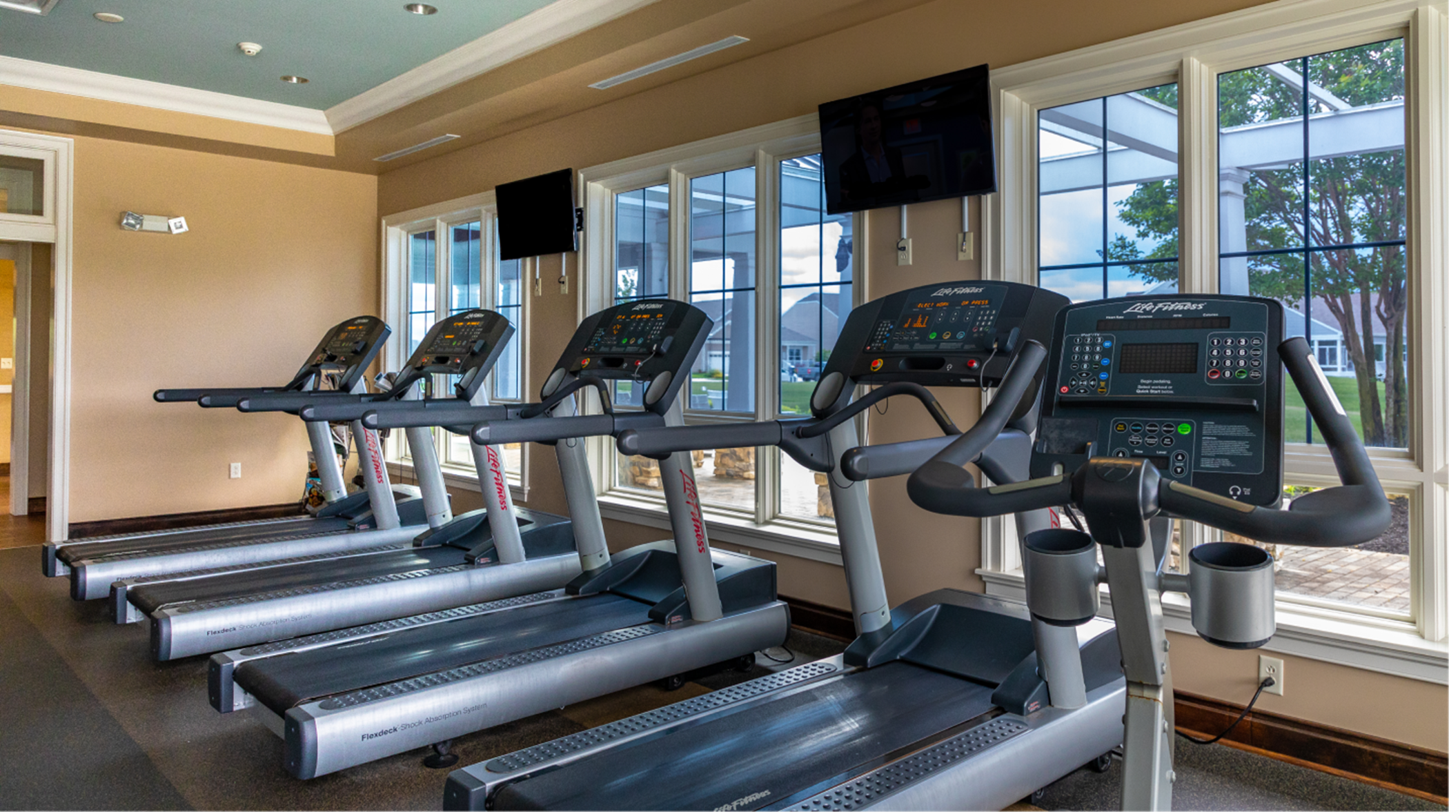 Fitness center showing treadmills