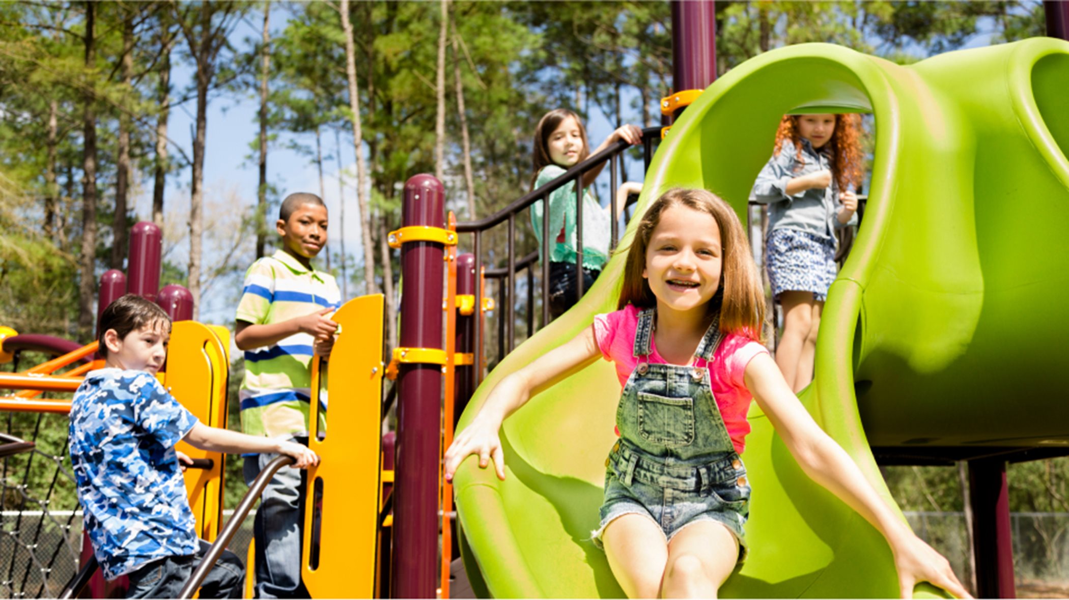 Kids on a playground slide