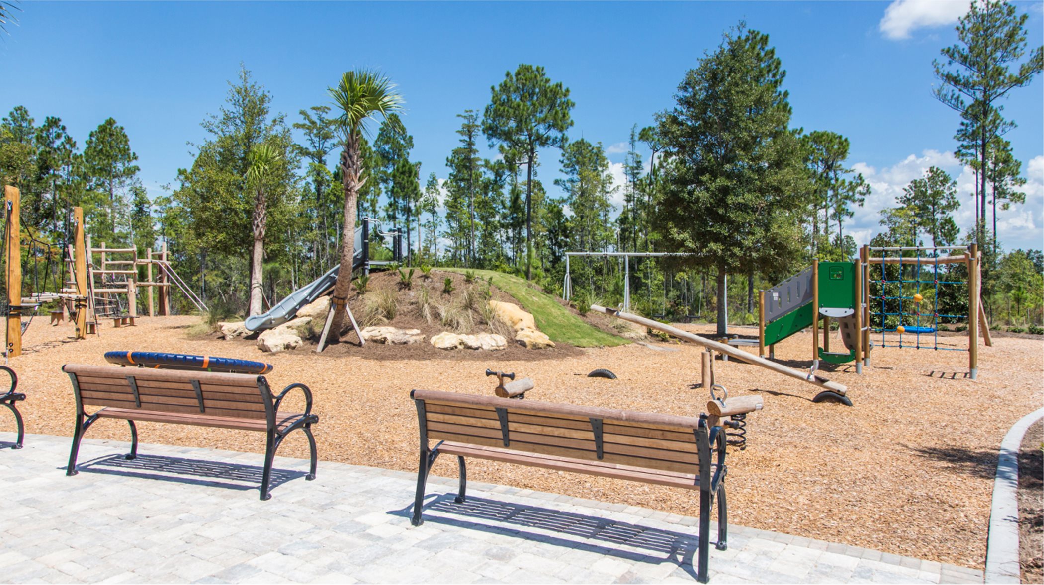 Benches facing the playground