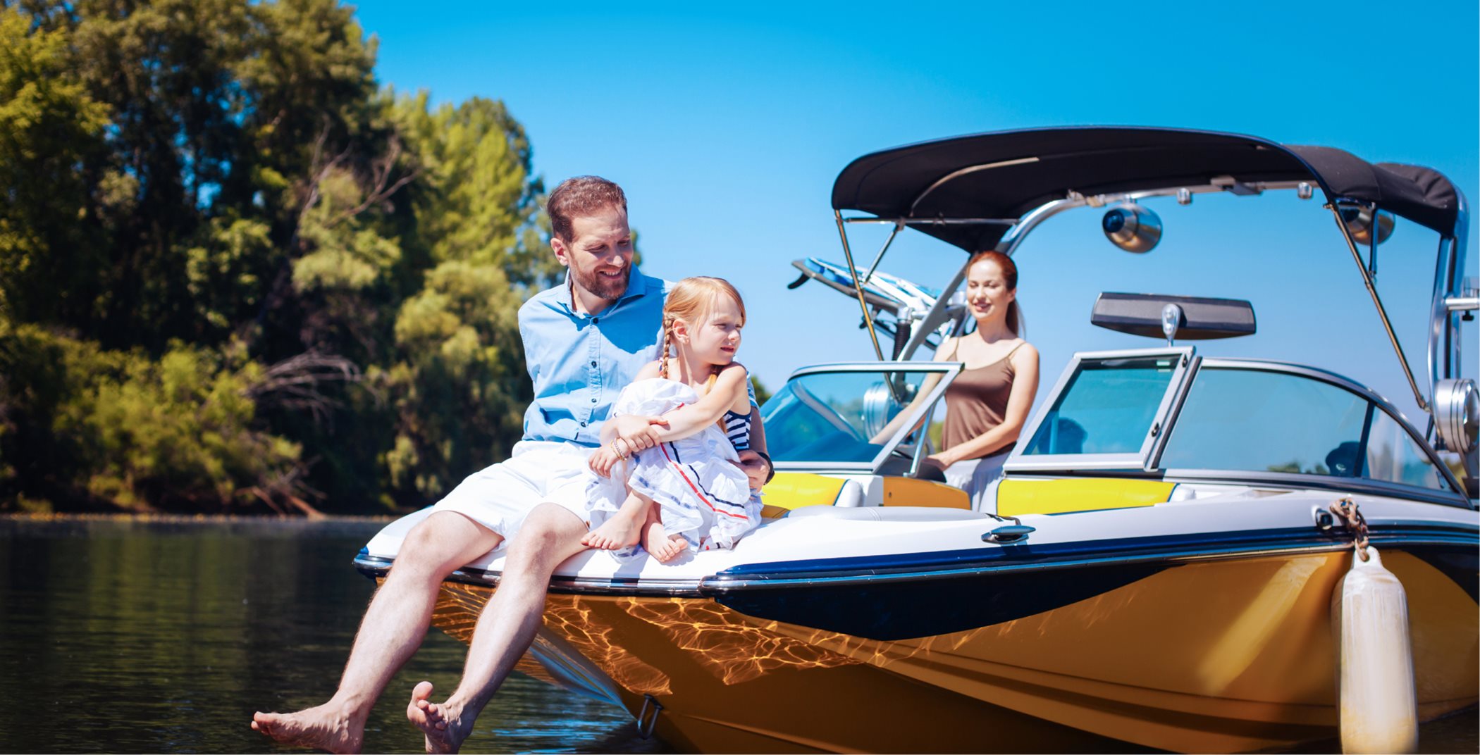 Family on a boat in marina