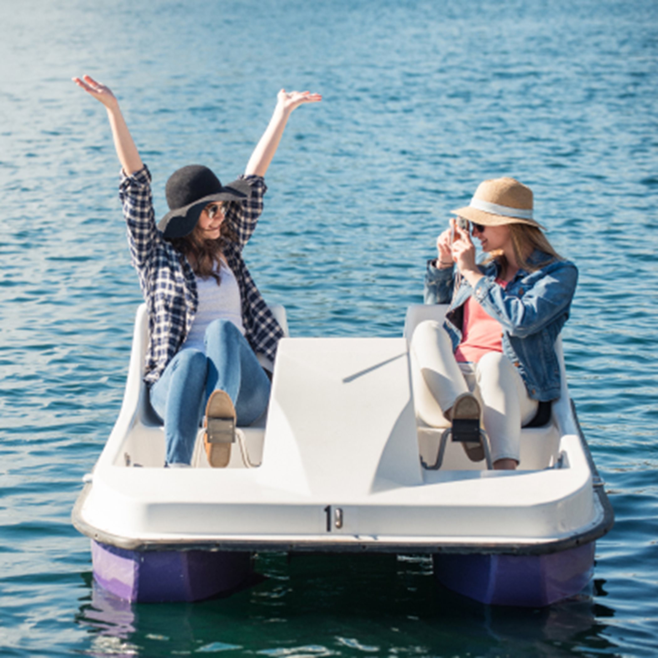 Two women on the paddle boat