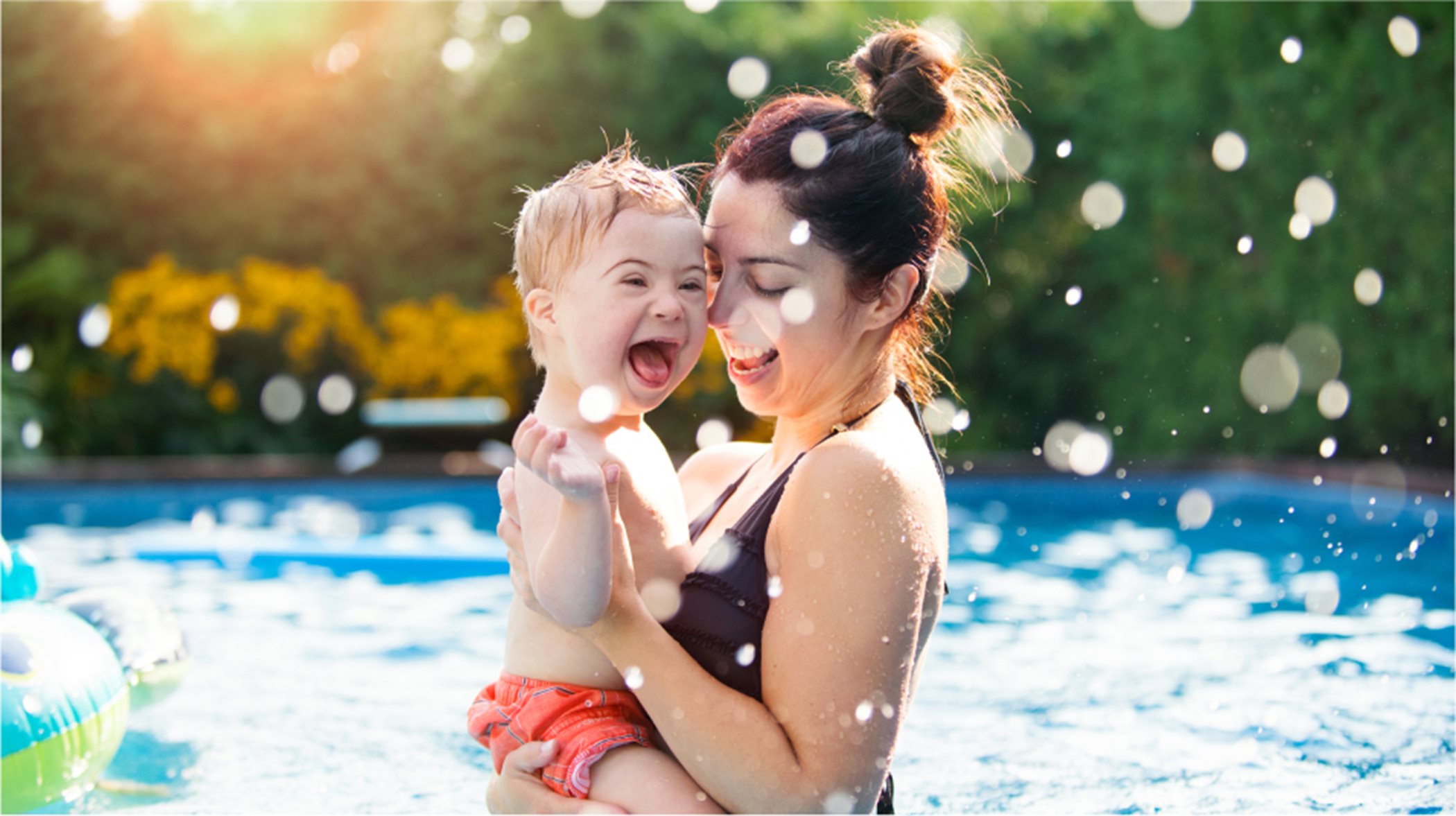 Mom and toddler in pool