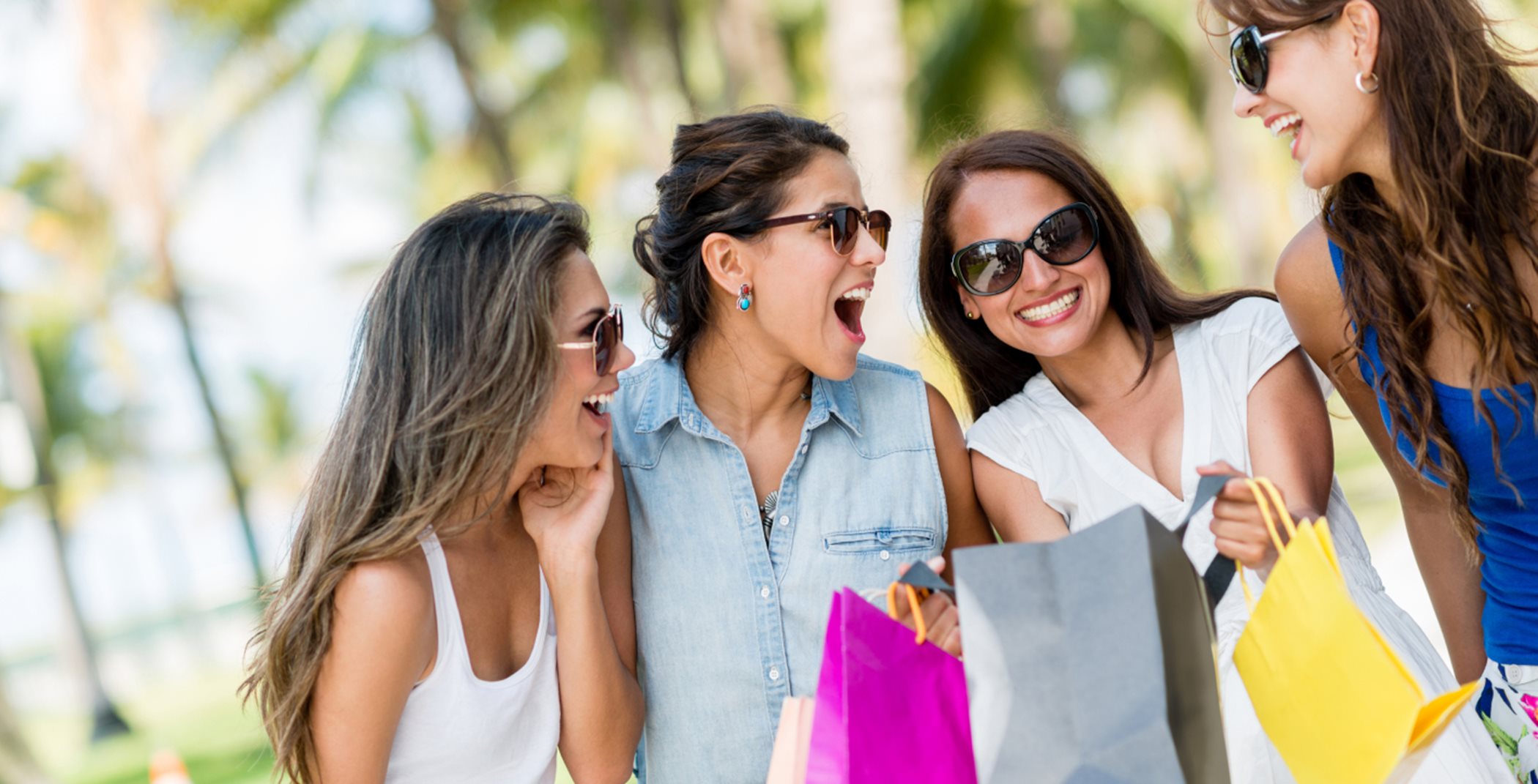 Friends laughing and shopping