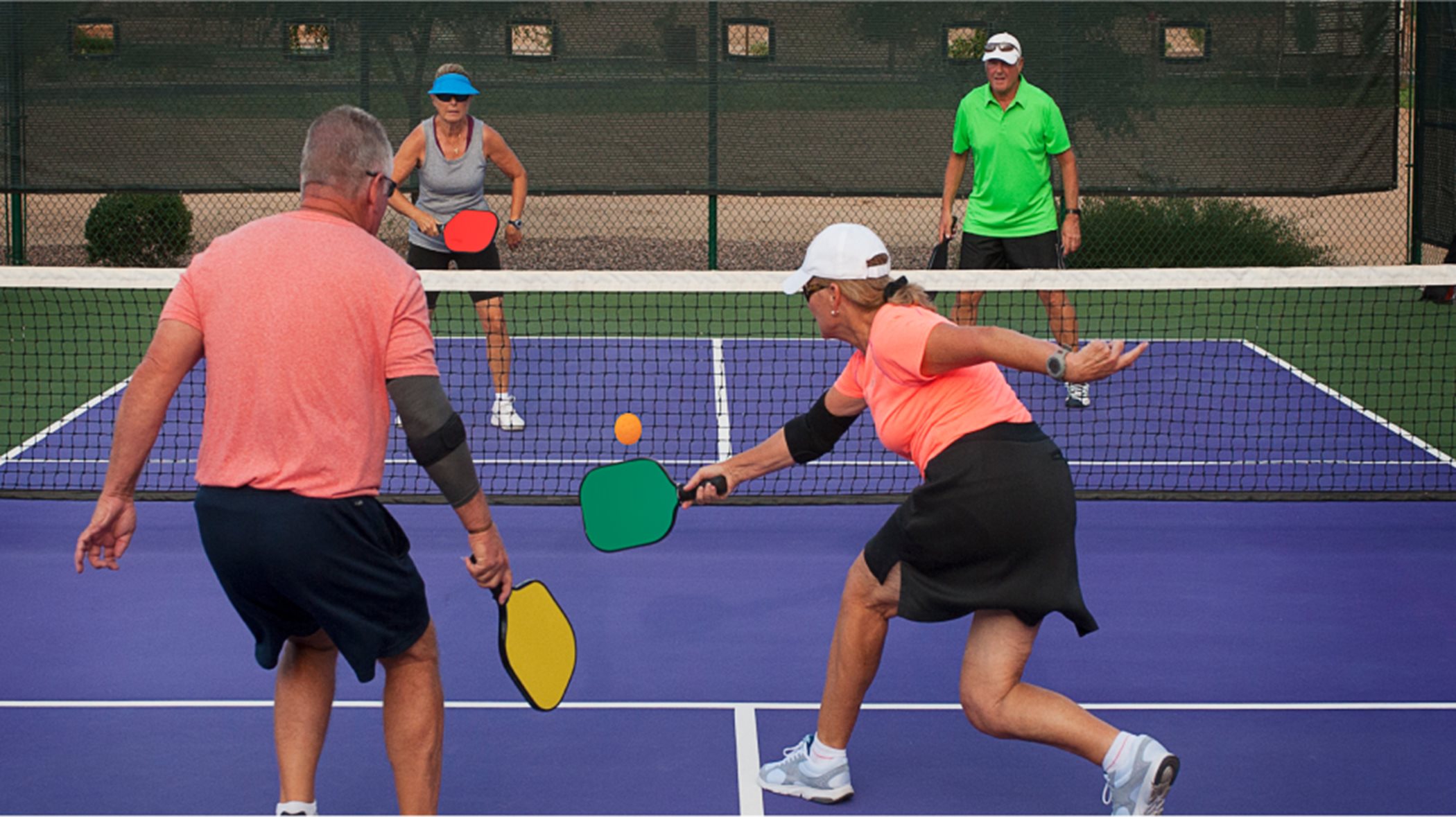 Friends playing pickleball