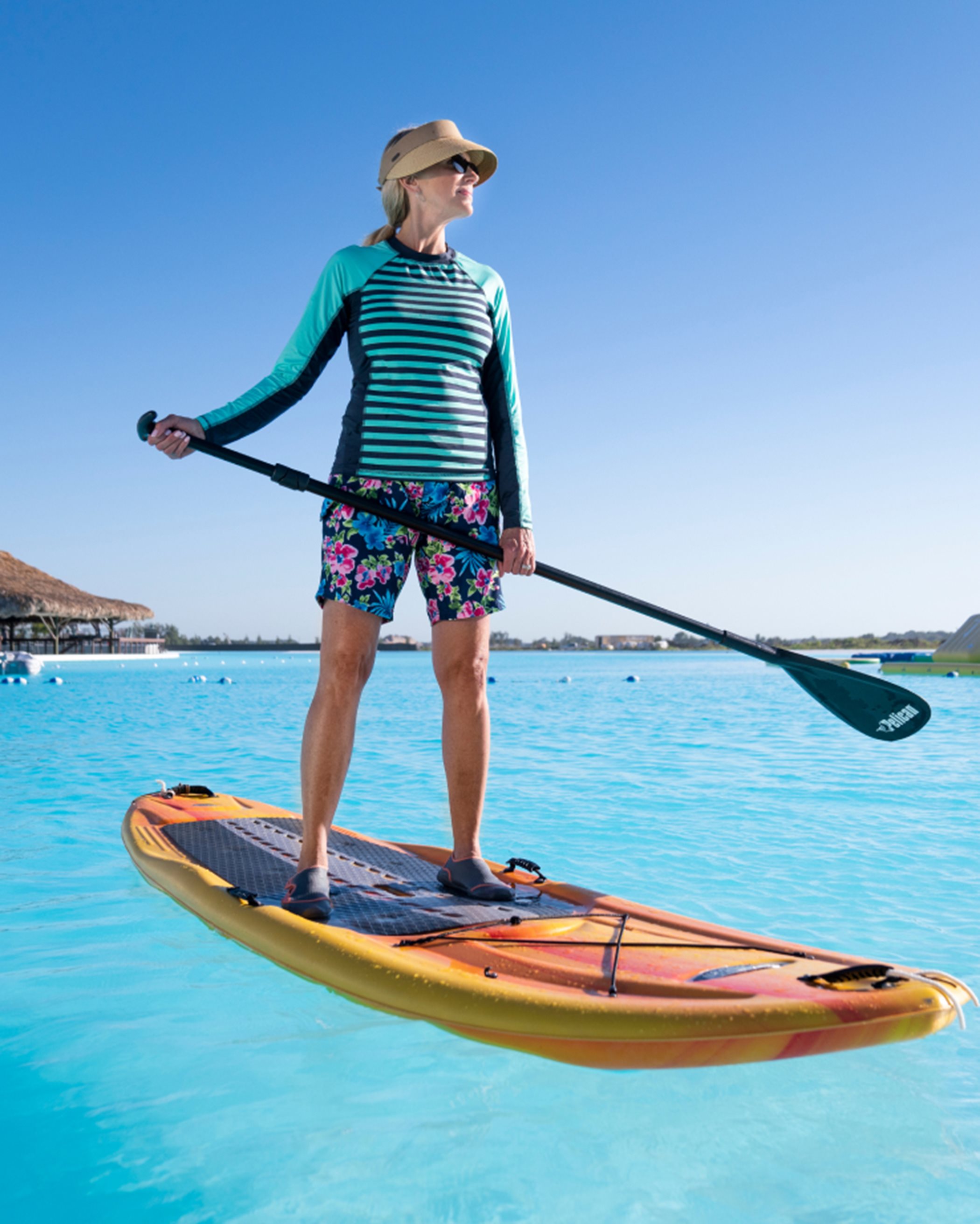A person paddle boarding