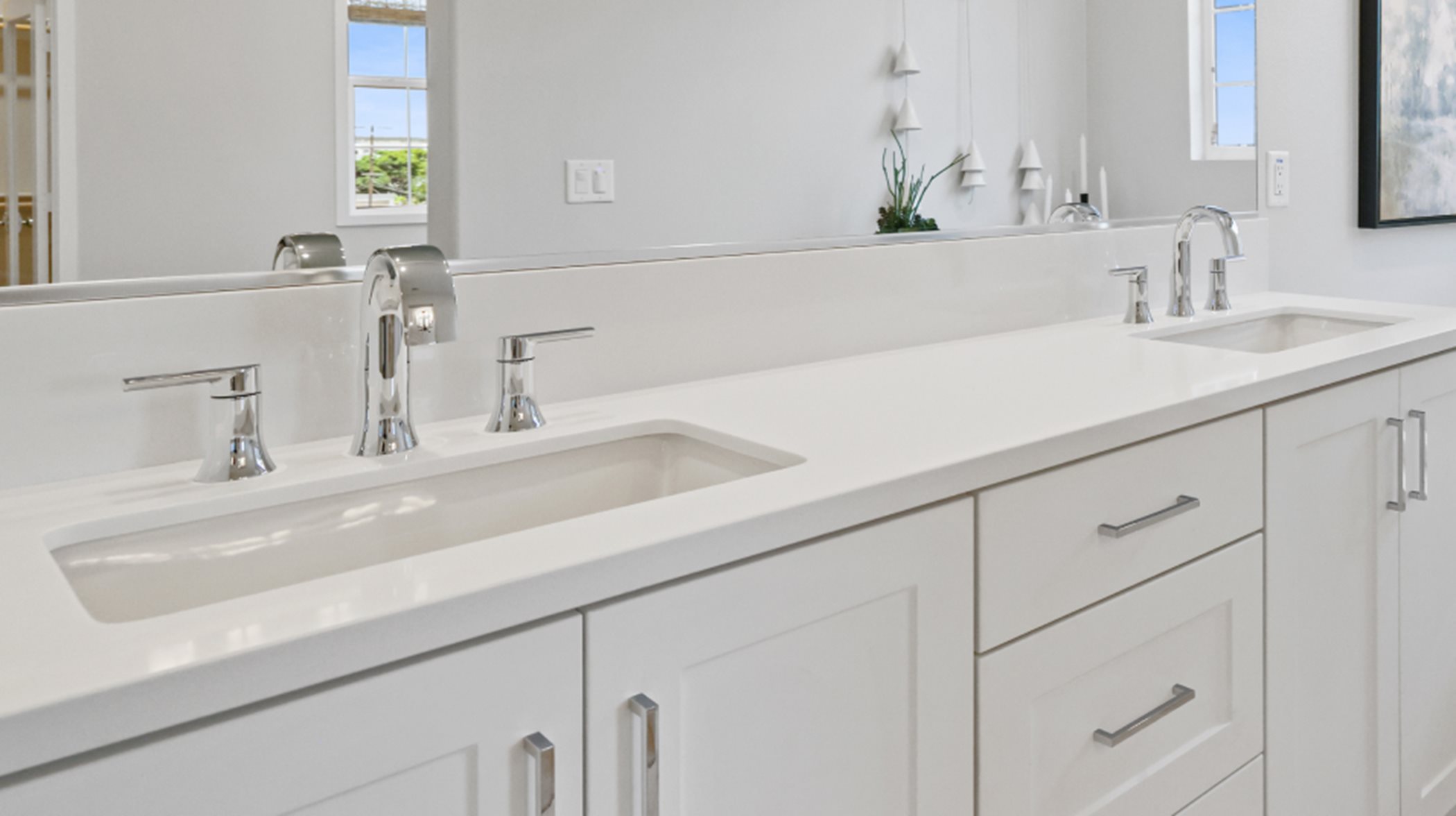 dual sinks in the private owner's bathroom