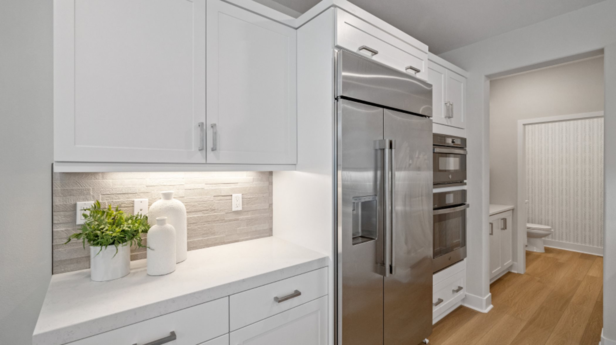 Fridge and kitchen cabinetry