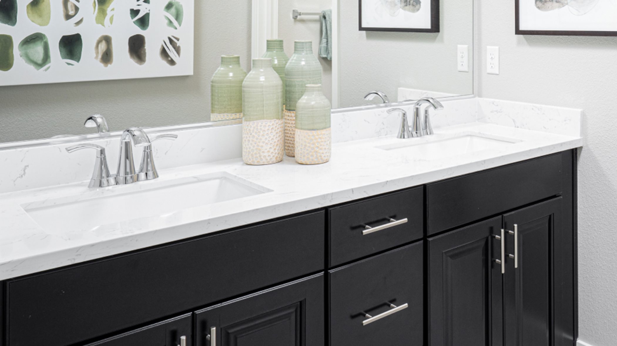 Dual sinks in the owner’s suite bathroom promotes a streamlined morning routine