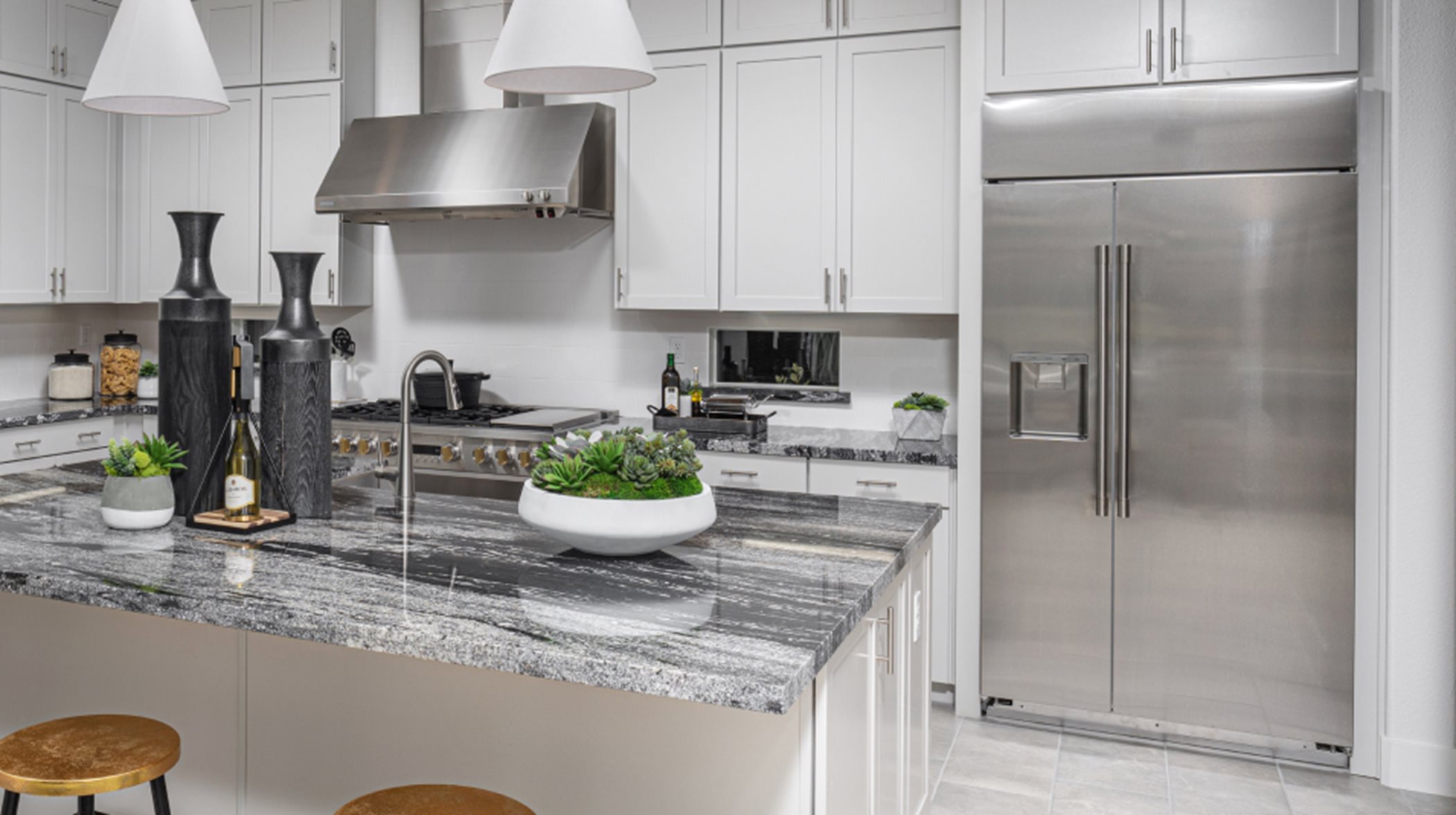 Sleek countertops offer a heat and stain-resistant surface