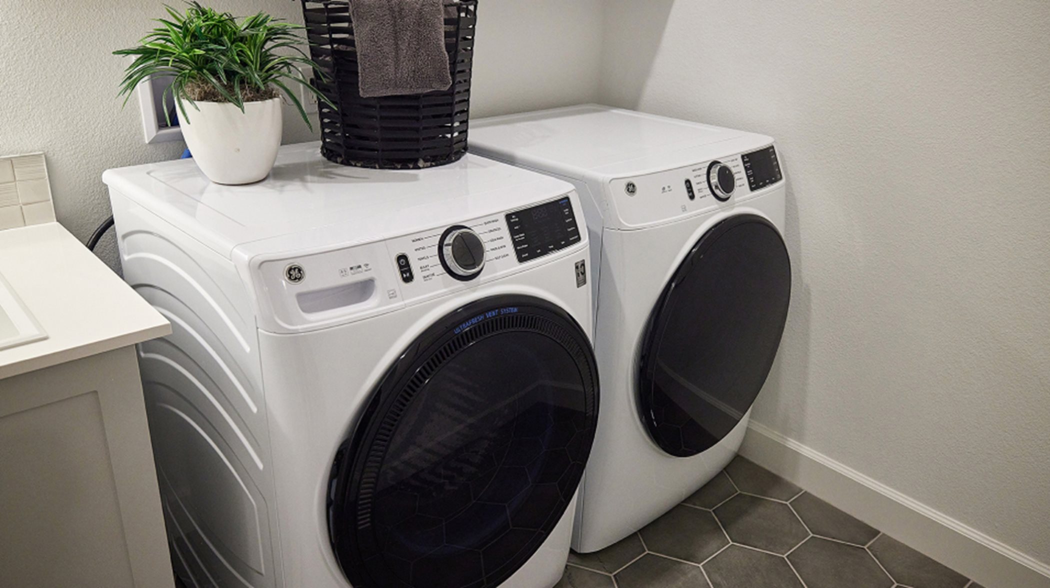 The energy-efficient washer and dryer found in the laundry room helps make chore days simple