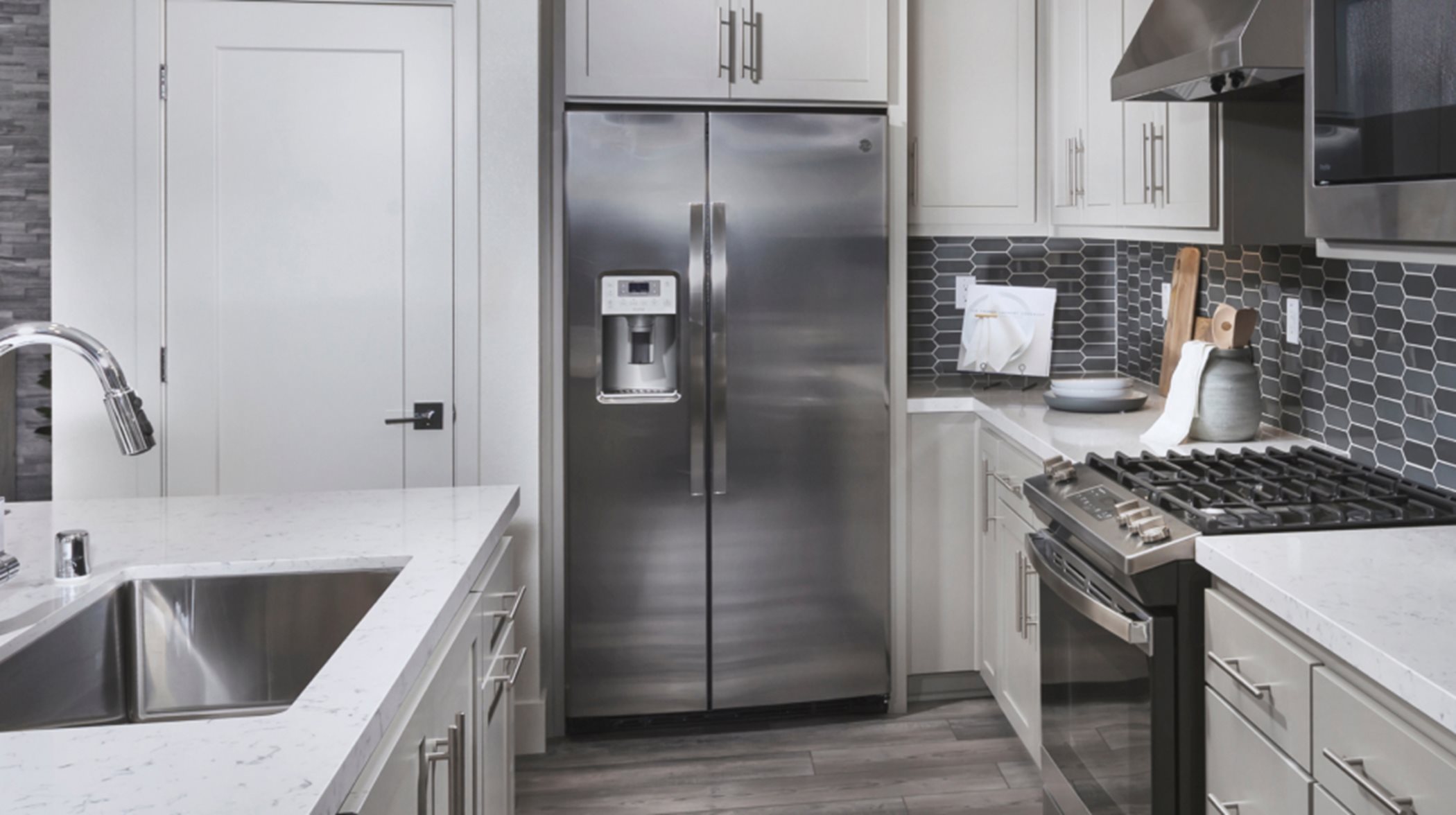 Bungalows stainless steel appliances in kitchen with island