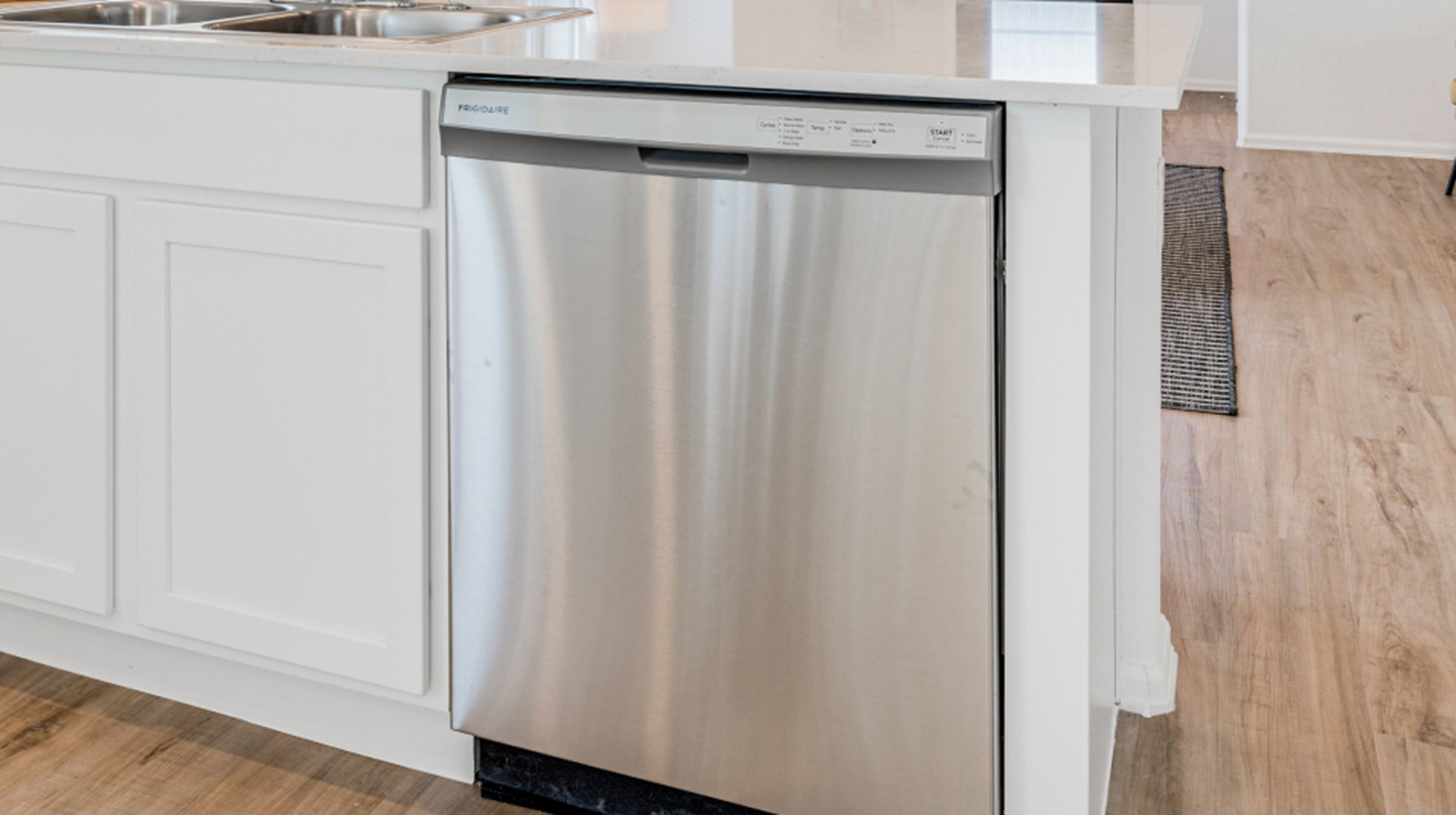 A brand-new stainless steel dishwasher helps make clean-ups simple 