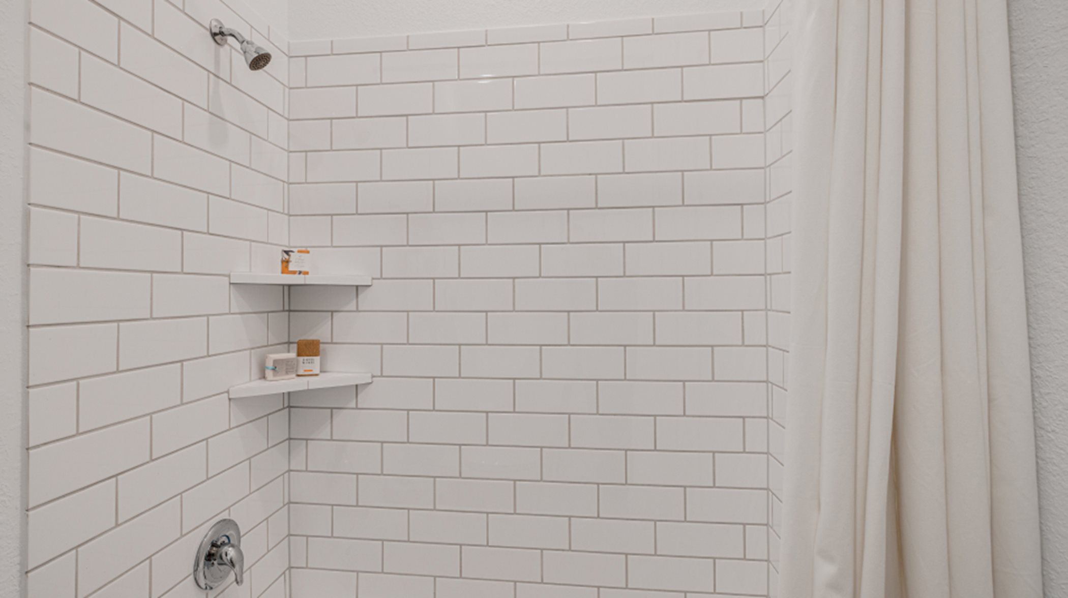 Showers with attractive and durable tile surrounds 