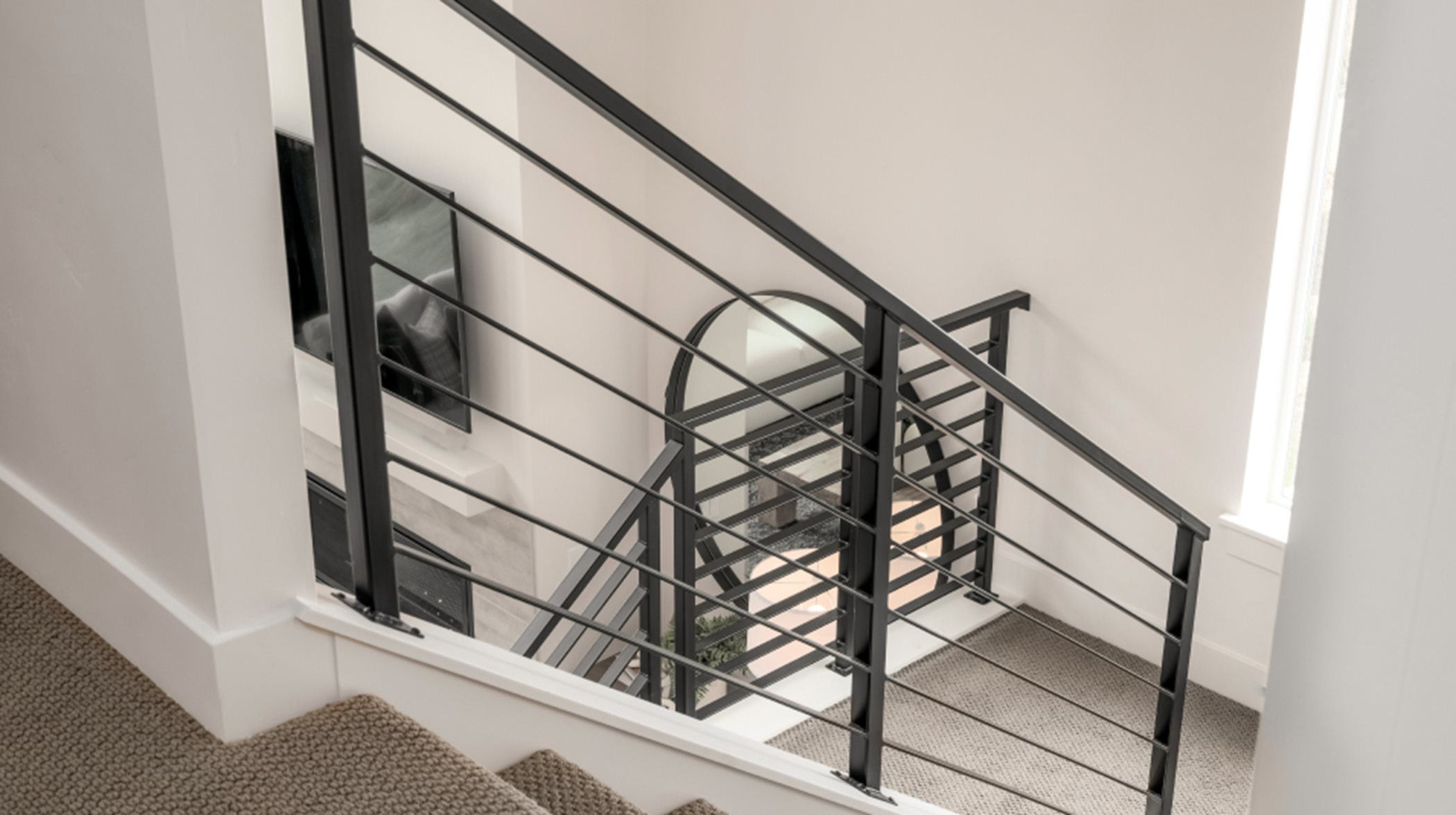 Stylish and contemporary metal stair railing 