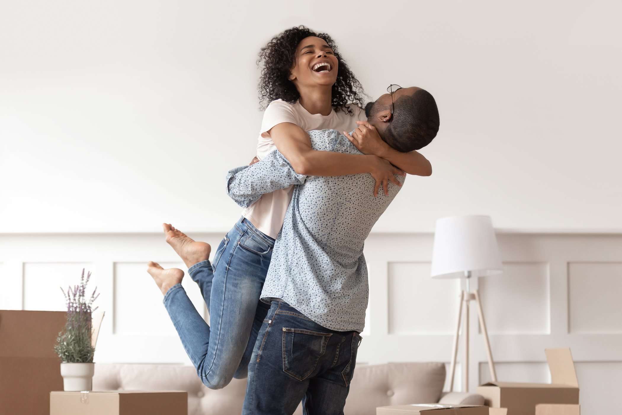 couple hugging in new home